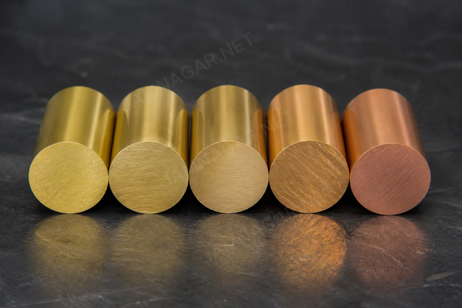 Brass rods and machined components representing common alloy grades Brass rods and machined components representing common alloy grades